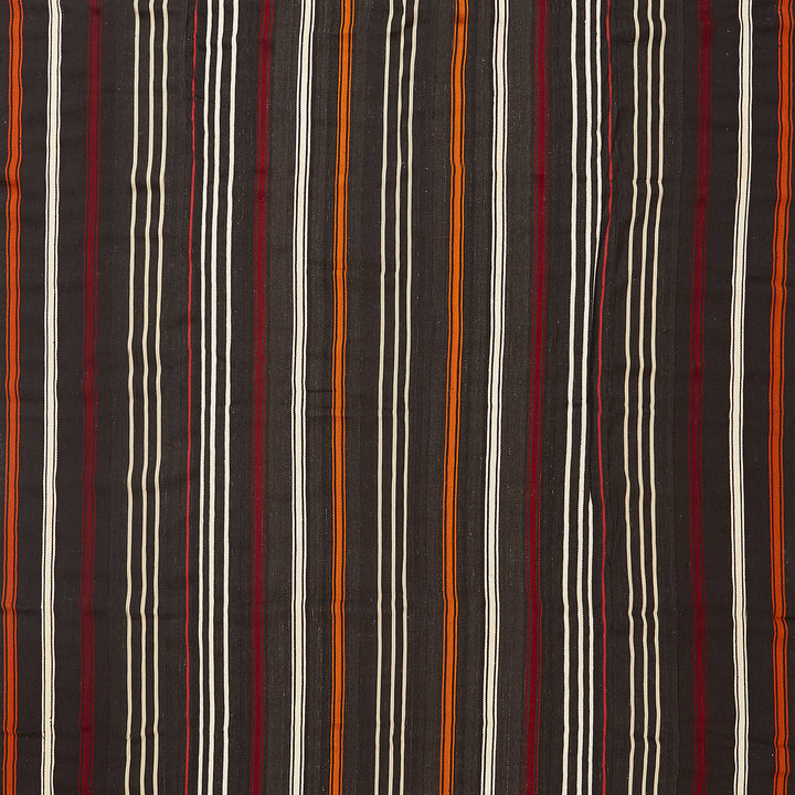 Close-up of a vibrant striped fabric with woven texture.