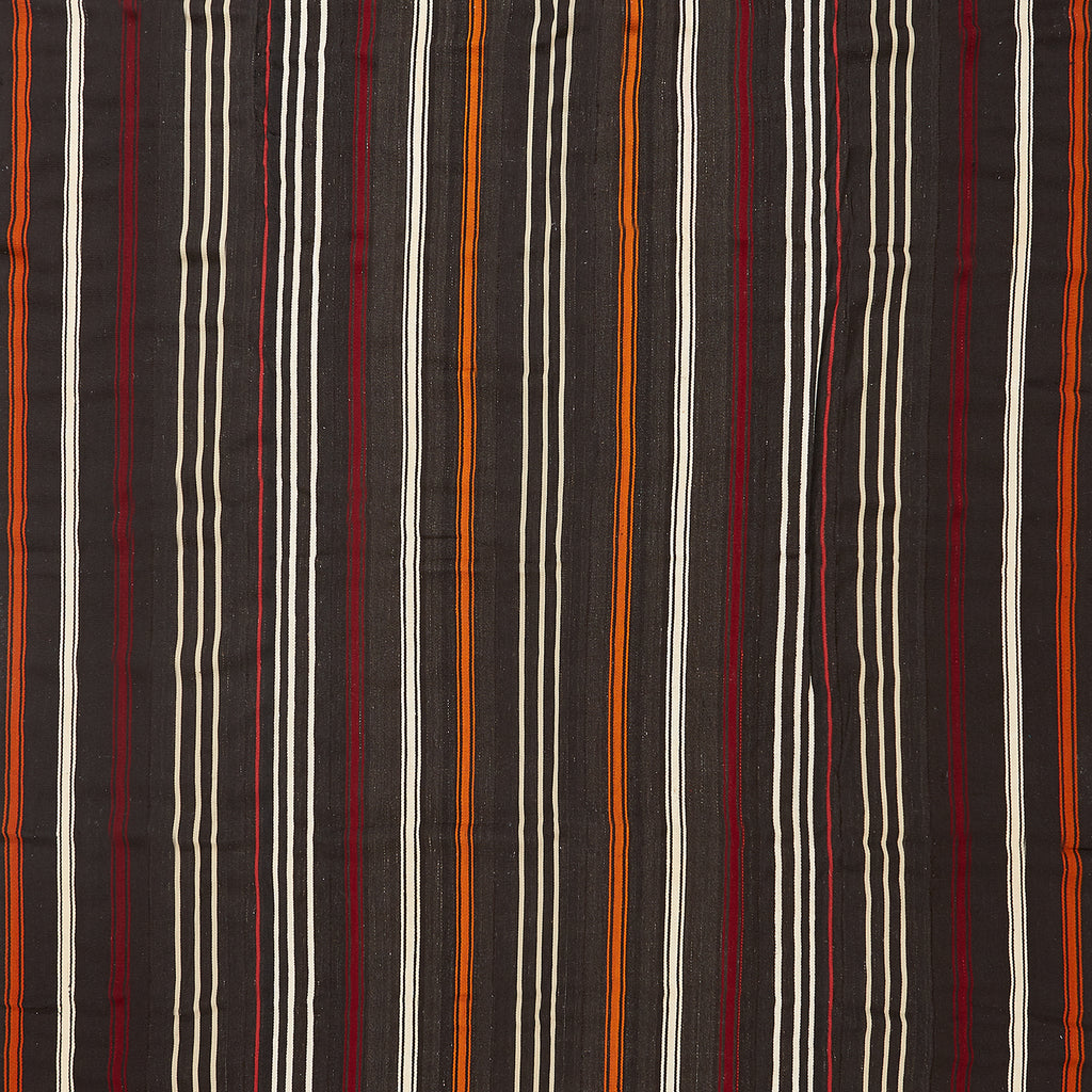 Close-up of a vibrant striped fabric with woven texture.