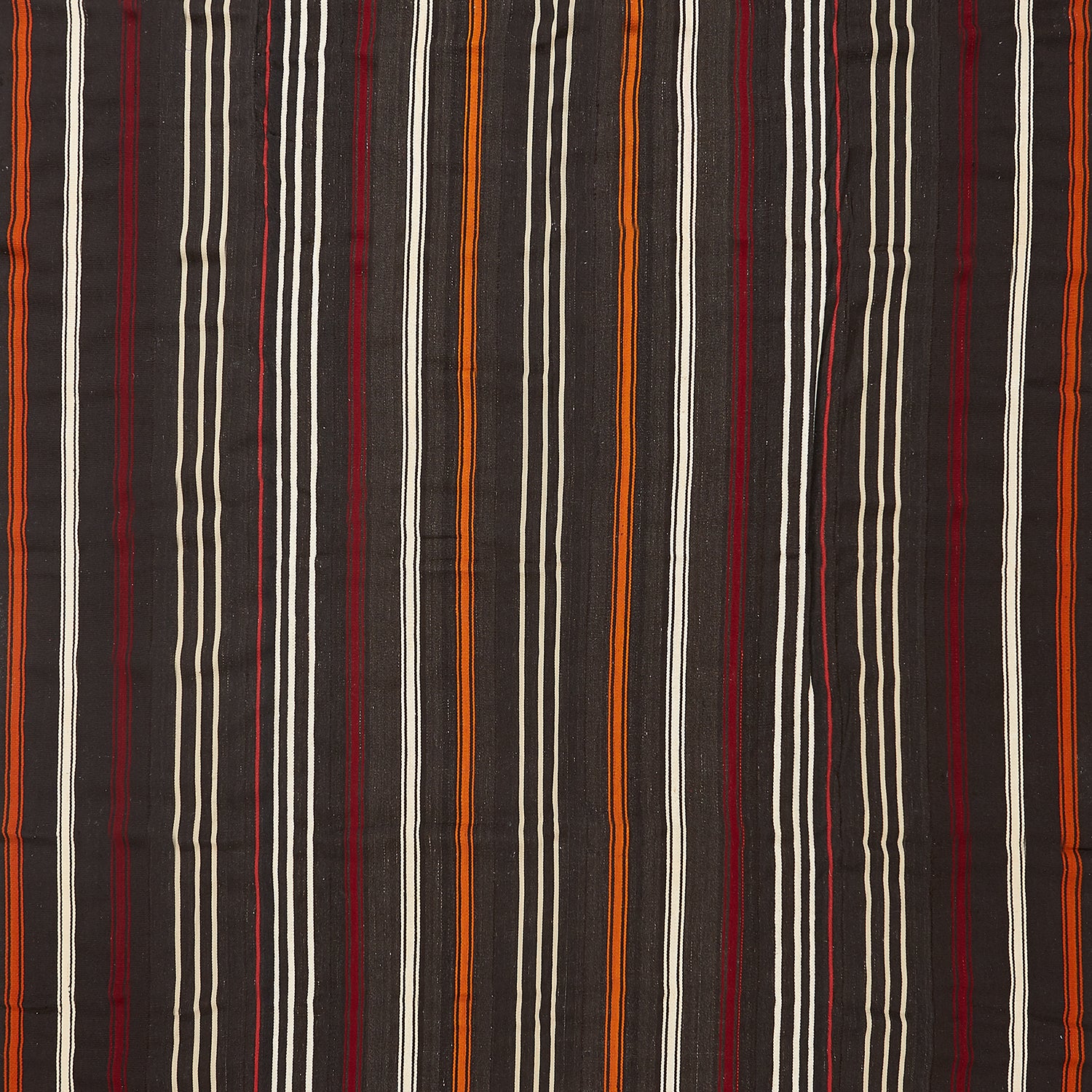 Close-up of a vibrant striped fabric with woven texture.