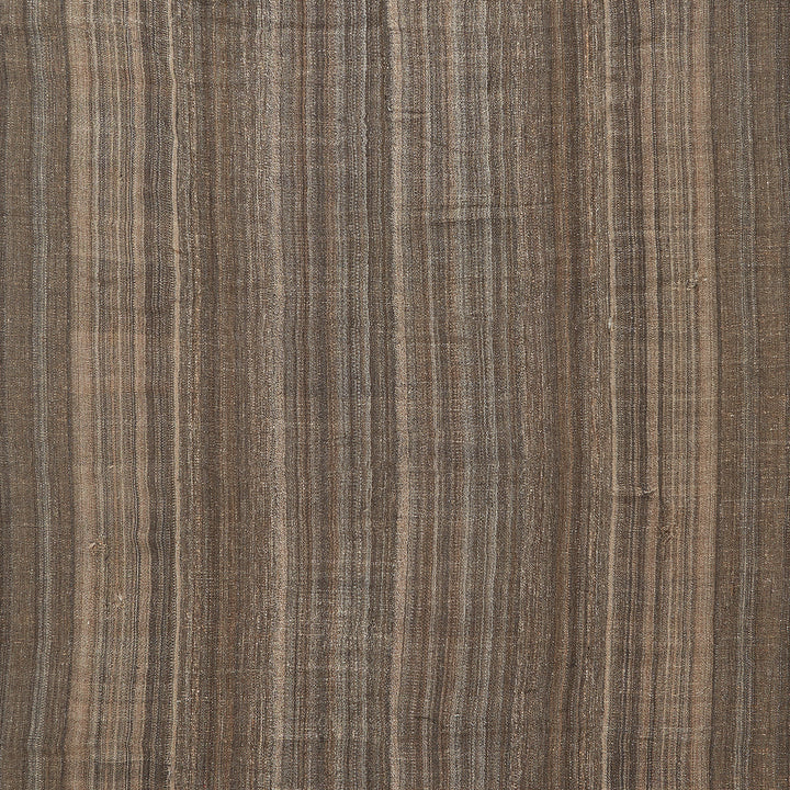 Abstract wood-like textured surface with varying shades of brown and beige.