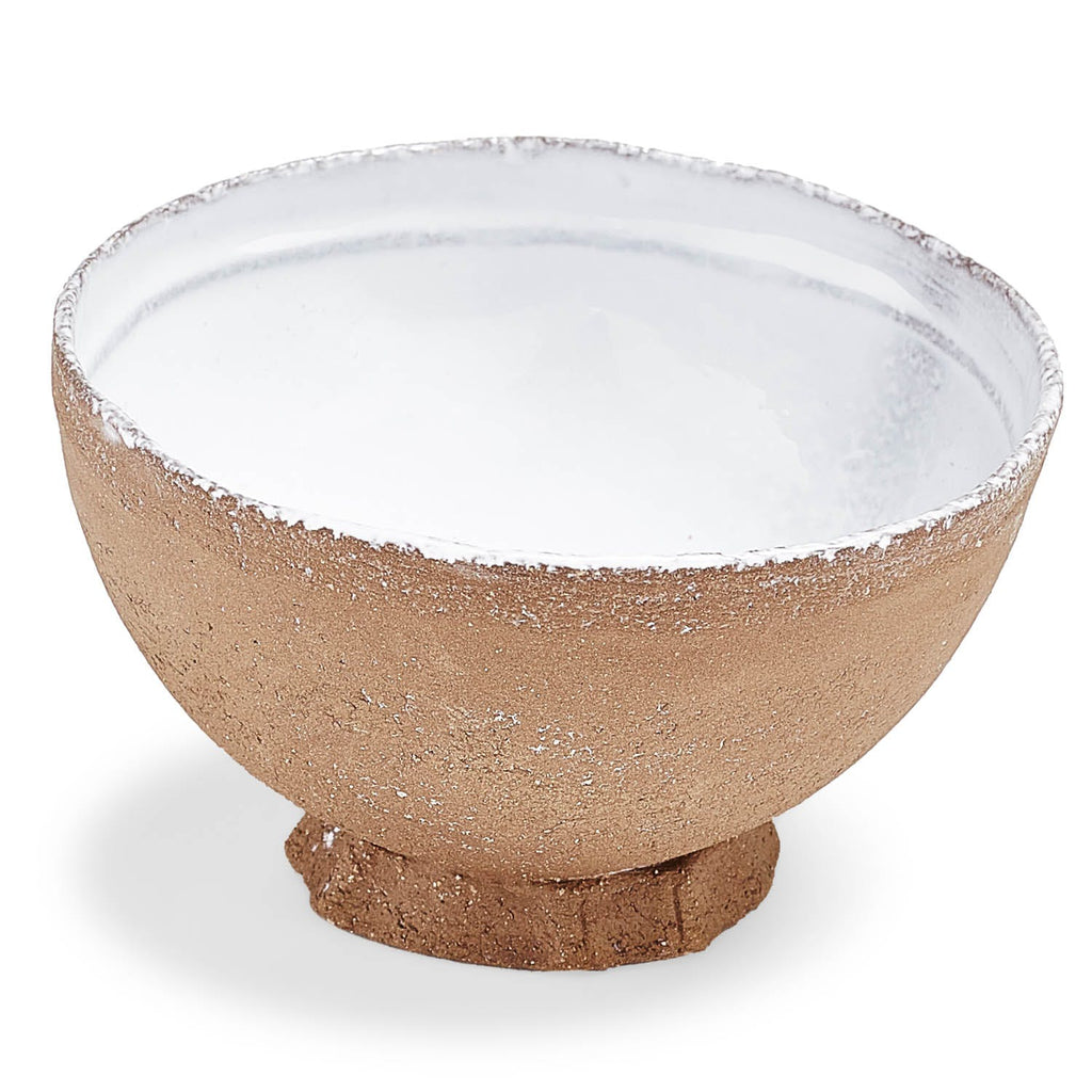 Handcrafted ceramic bowl with rustic texture and glossy glazed interior