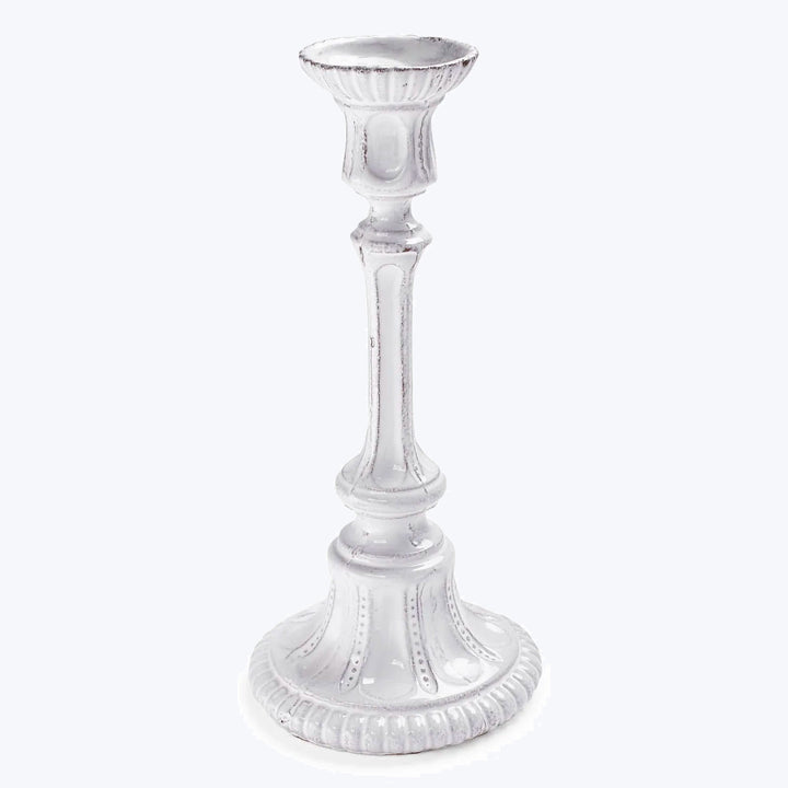 Ornate silver candlestick holder with classical design and beaded details.
