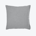 Square gray pillow with linen-like texture and product tag.