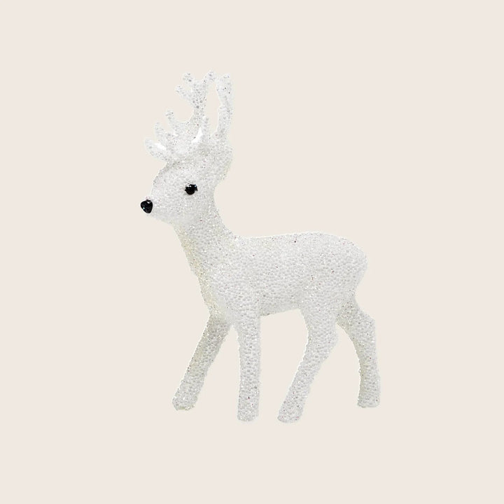 Shimmering white fawn figure with glittery texture and festive design.