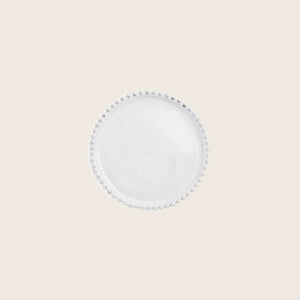 Translucent circular object with bead-like protrusions, minimalistic design.