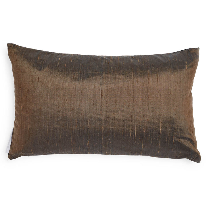 Rectangular pillow with distressed brown fabric cover, well-crafted and plush.