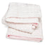 Soft and cozy plush blanket with delicate textured pattern.