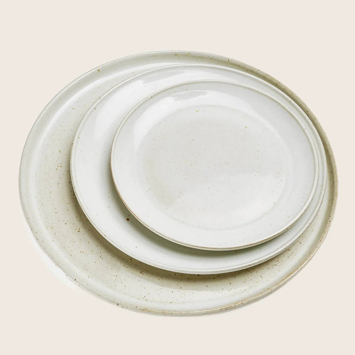 white ceramic dinnerware handmade cocina abc restaurant