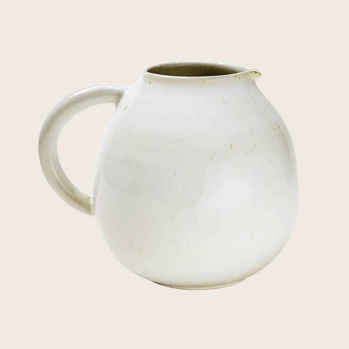 white handmade pitcher ceramic abc concina restaurants
