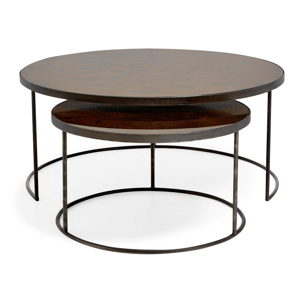 Contemporary two-tiered coffee table with dark wood tops and metal frame.