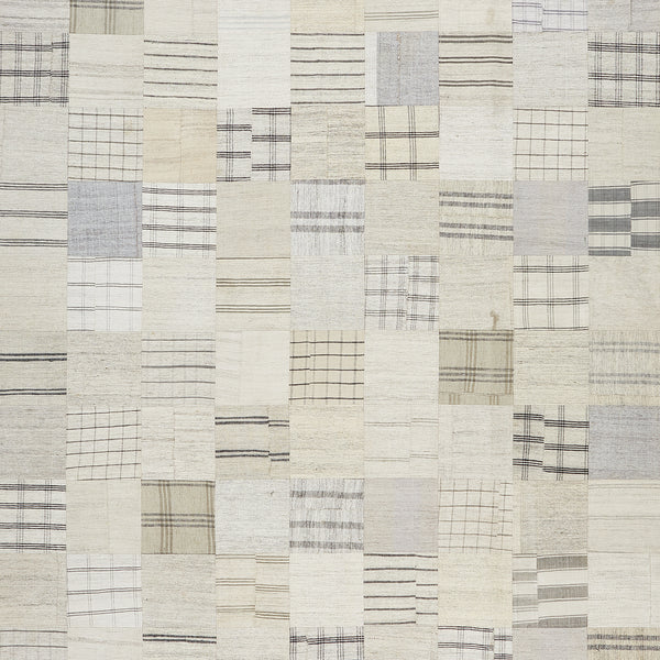 Minimalist textile pattern with neutral tones and woven texture.