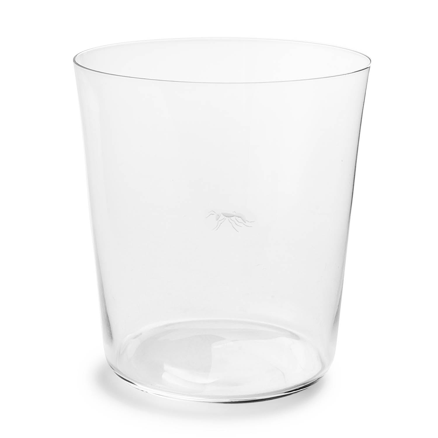 Clear glass tumbler on a white background, featuring subtle logo.