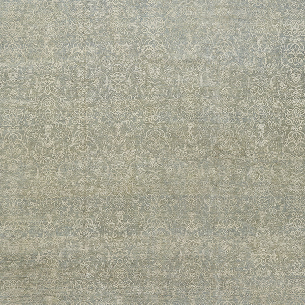 Ornate patterned fabric surface with vintage color palette and symmetry.
