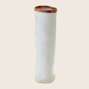 Handmade white ceramic vase with unique brown rim and imperfections.