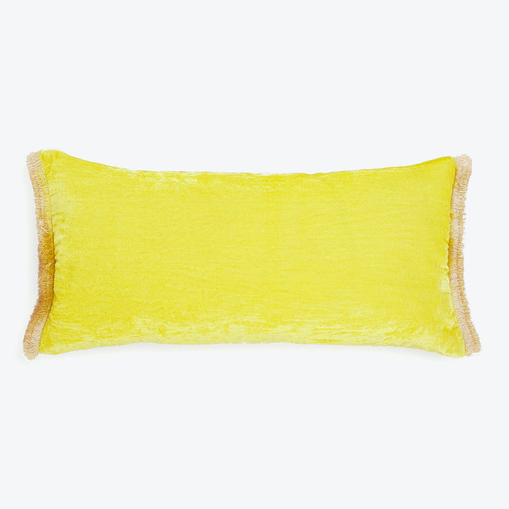 Vibrant yellow rectangular pillow with textured fabric and fringe trim.
