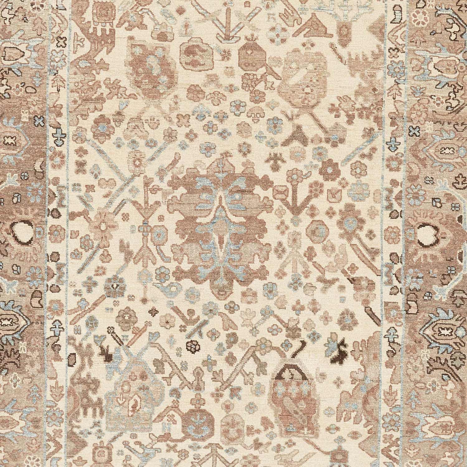 Vintage Persian-style rug featuring intricate floral and geometric motifs.