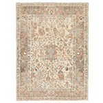 An ornate rectangular area rug featuring a symmetrical, muted design.