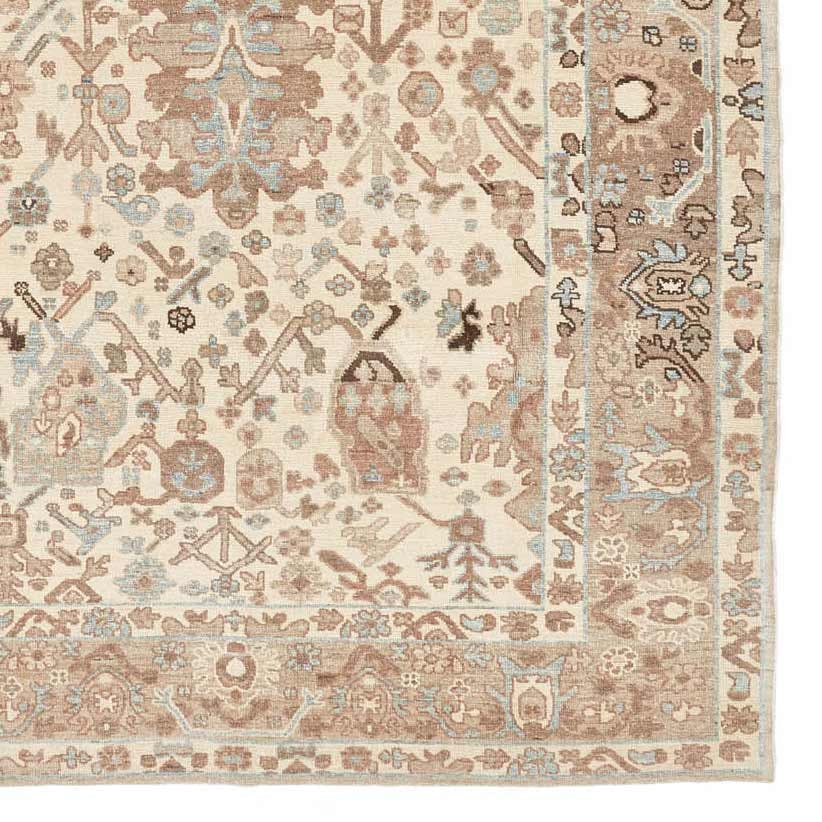 Intricate Oriental rug showcases traditional craftsmanship with stunning floral motifs.