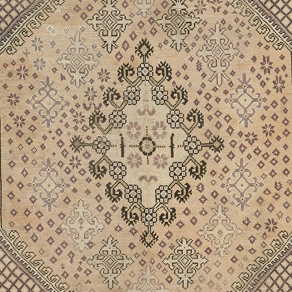 Intricate symmetrical design of a high-quality, handwoven carpet.