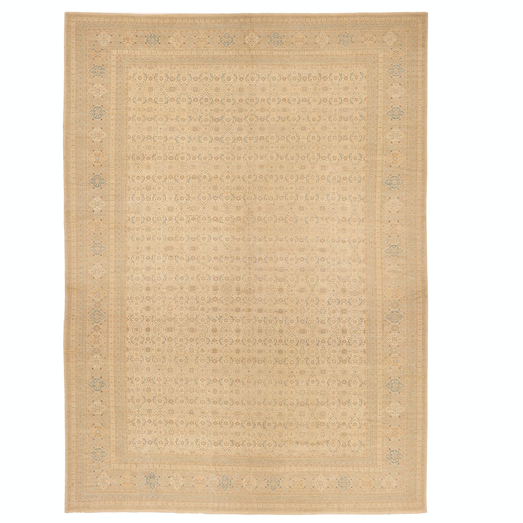 Intricately designed handwoven rug with neutral beige and brown tones.