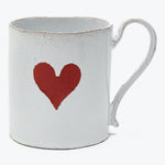 Rustic white mug with distressed texture and painted red heart.