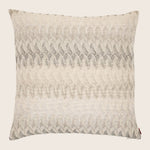 Contemporary square decorative pillow with textured fabric and wave-like pattern.