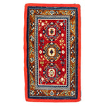 An exquisite Oriental hand-woven rug showcasing intricate geometric patterns.