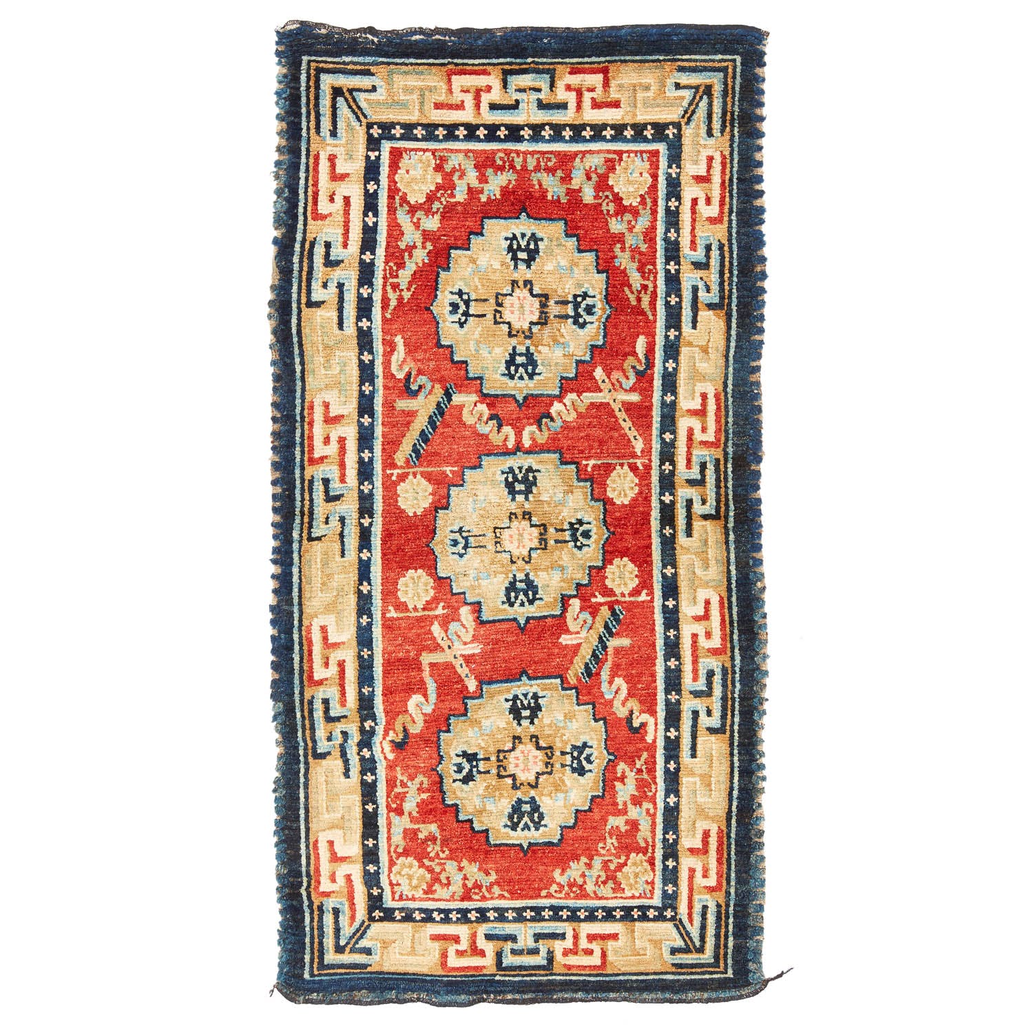 Hand-knotted antique rug with red diamond medallions and intricate borders.