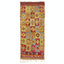 Colorful geometric rug with intricate woven patterns and fringe detail.