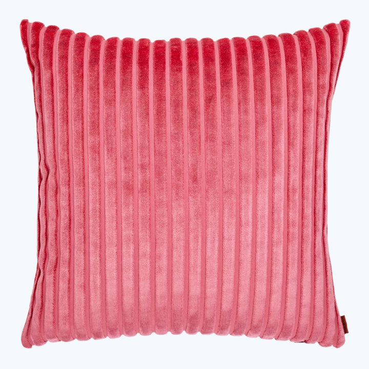 Vibrant red pillow with soft, velvety texture and ribbed design.