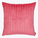 Vibrant red pillow with soft, velvety texture and ribbed design.