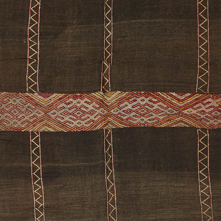 Artisanal textile showcasing intricate design and cultural influences.