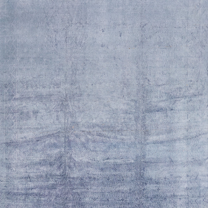 Abstract blue and grey textured surface with weathered concrete-like appearance