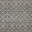 Patterned floral fabric or wallpaper with intricate white outlines.
