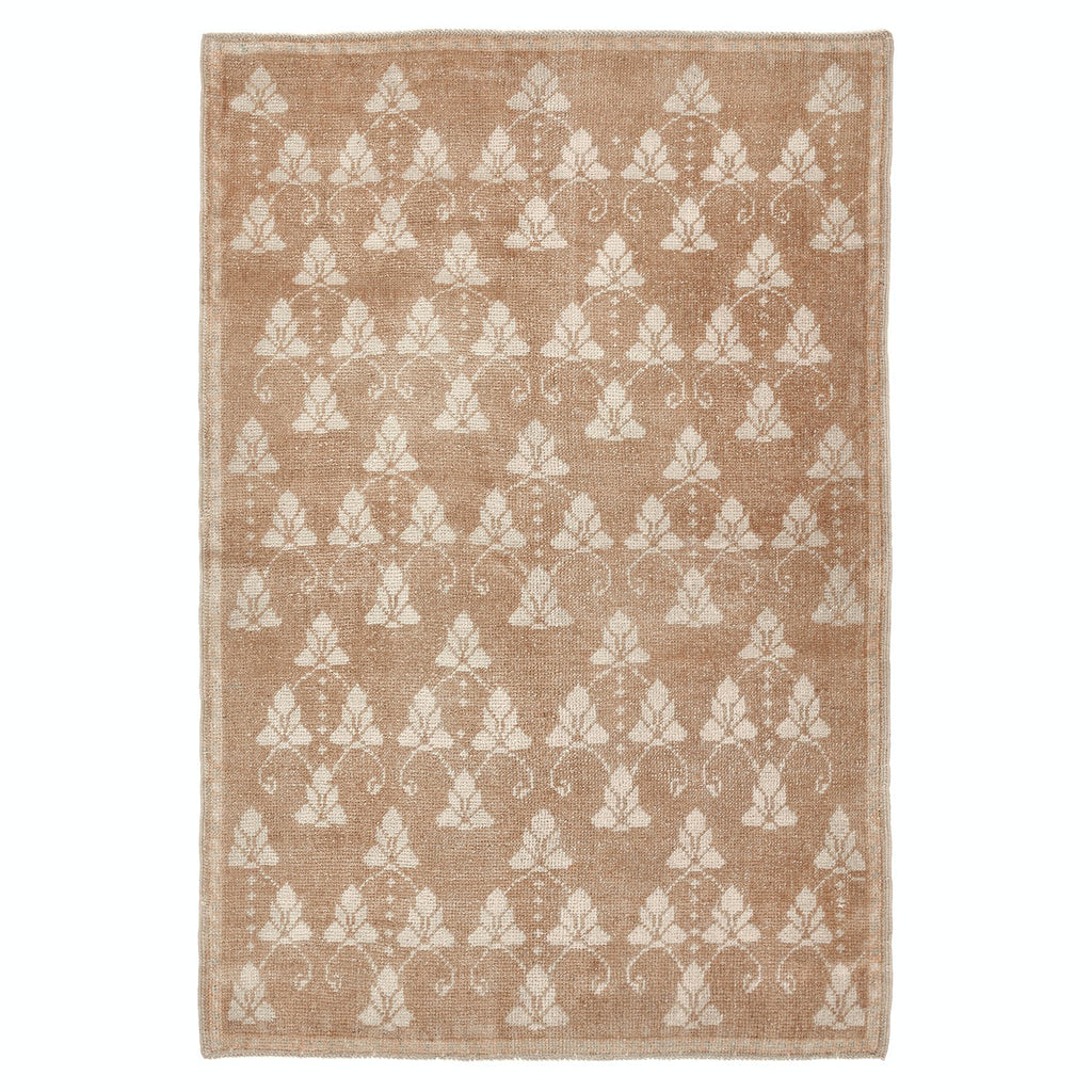 Rectangular rug with elegant floral pattern in light brown/beige background.