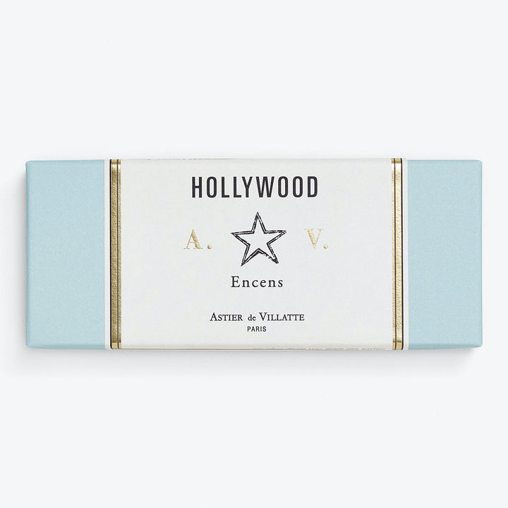 Minimalistic Hollywood-themed box with gold accents and French incense brand.