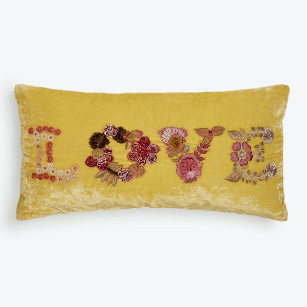 Mustard yellow decorative pillow with handcrafted floral 'LOVE' embroidery