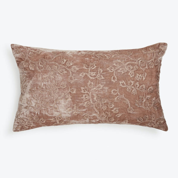 Elegant dusky pink pillow with raised floral pattern and sheen.