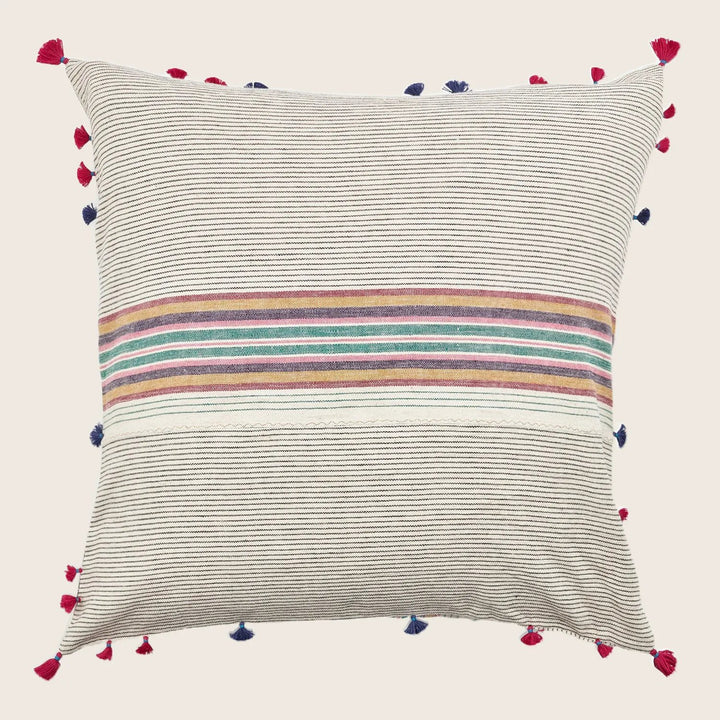 Bohemian throw pillow with textured fabric, colorful stripes, and tassels.