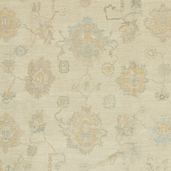 Traditional rug with intricate design in muted beige and blue.