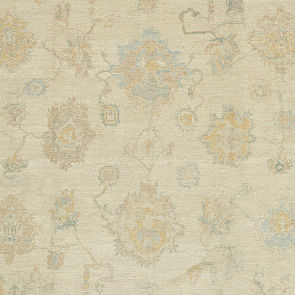 Traditional rug with intricate design in muted beige and blue.