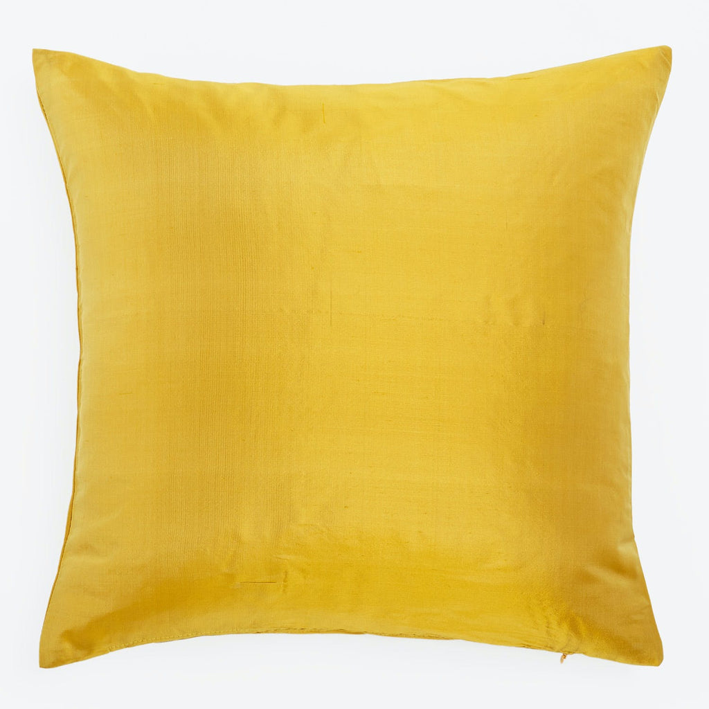 Bright yellow square throw pillow with smooth textured fabric cover.