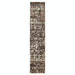 Vertical runner rug with distressed abstract pattern in brown and white