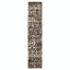 Vertical runner rug with distressed abstract pattern in brown and white