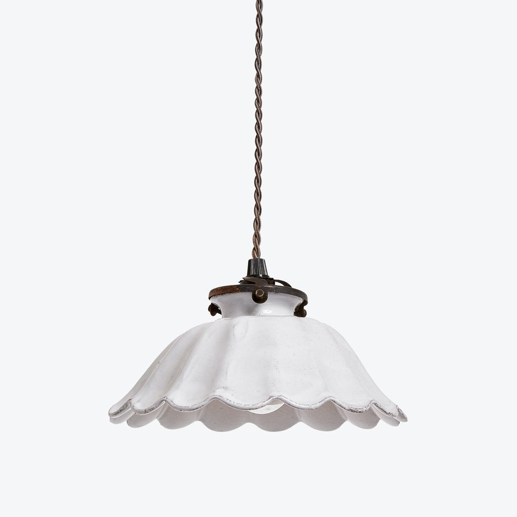 Vintage-style pendant light with fluted white glass lampshade hangs elegantly.