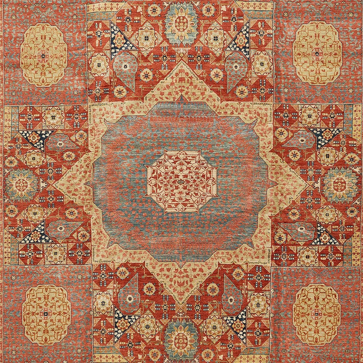 Exquisite symmetrical oriental carpet with intricate patterns and vibrant colors.