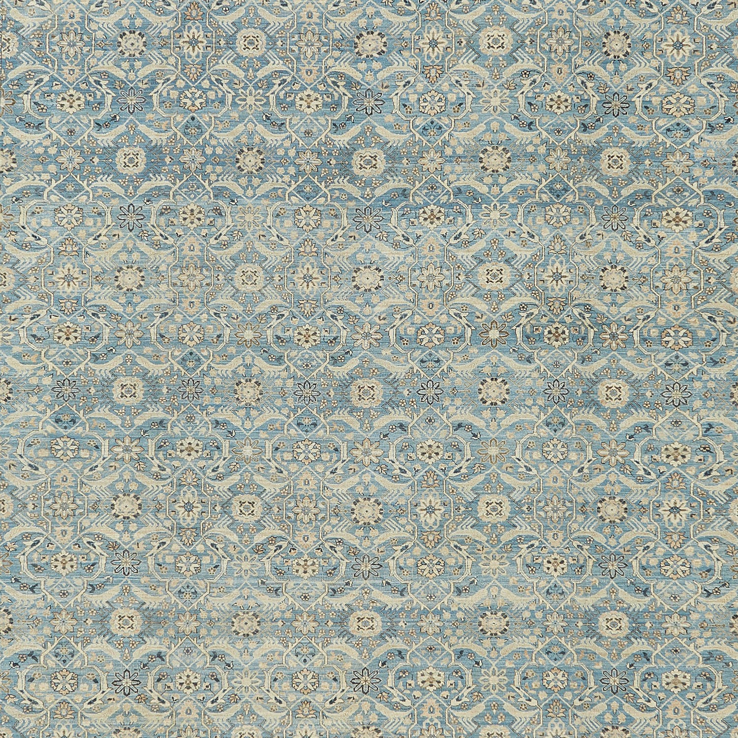 Intricate floral motif textile with classical Victorian influence in soft blue.