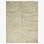 Symmetrical beige rug with raised central divide for added texture