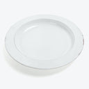 Plain white, circular plate with a chip on the edge.