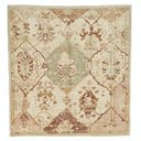 Vintage handwoven rectangular rug with ornate symmetrical pattern in muted tones.